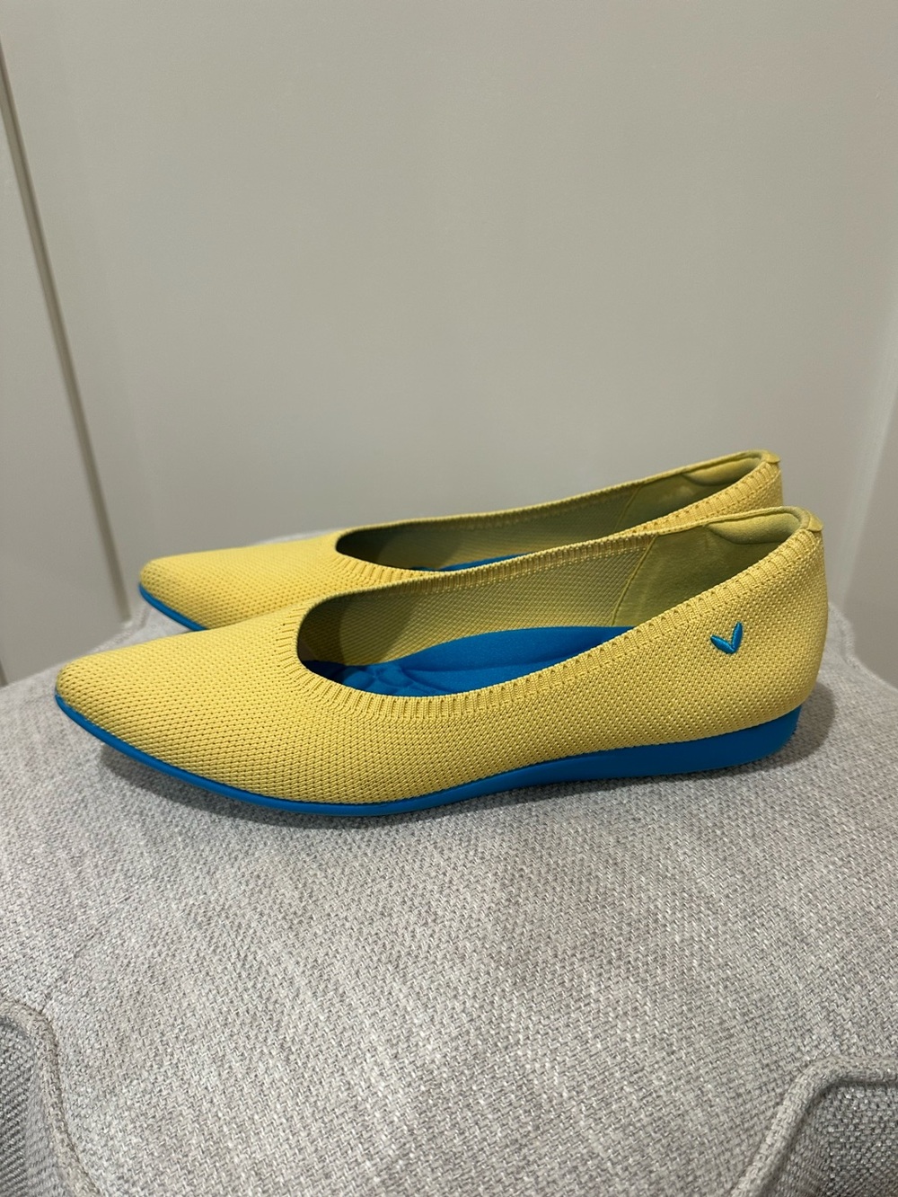 VIVAIA size 39.5 yellow pointed toe flats with bright blue sole. Good condition